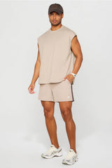 THE EFFORTLESS OVERSIZED MUSCLE TANK