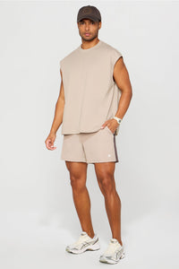 THE EFFORTLESS OVERSIZED MUSCLE TANK