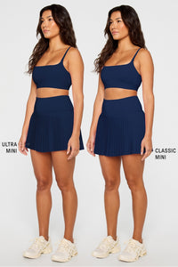 HOT SHOT PLEATED CLASSIC MINI SKIRT
